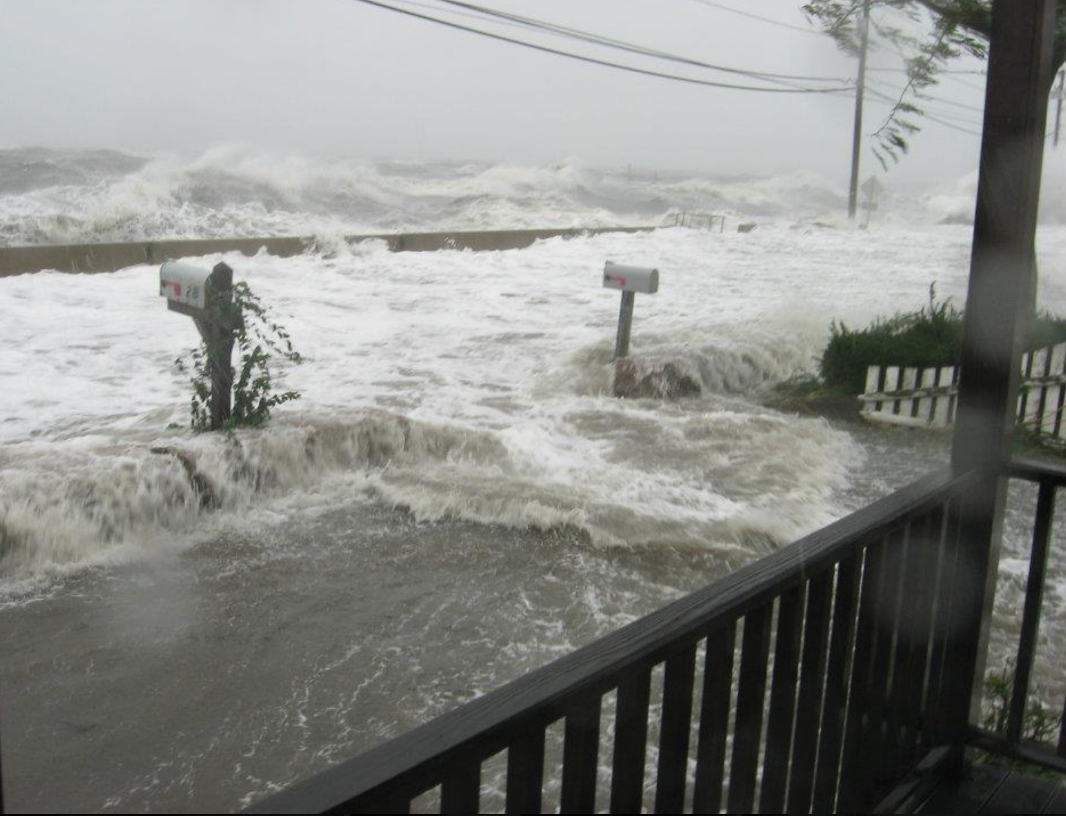 Waves completely overtake the road, sidewalk, and mailboxes. (Photos by Matilda Kreider/George Washington University)